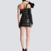 Asymmetric leather bodycon dress with chains