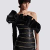 Asymmetric leather bodycon dress with chains