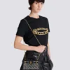 B-Buzz Small Top Handle monogrammed canvas and leather bag B-Buzz Small Top Handle monogrammed canvas and leather bag