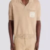 Balmain Écusson embroidered knit polo shirt Balmain Écusson embroidered knit polo shirt