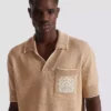 Balmain Écusson embroidered knit polo shirt Balmain Écusson embroidered knit polo shirt