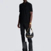 Cotton polo shirt with leather Balmain Couture label Cotton polo shirt with leather Balmain Couture label