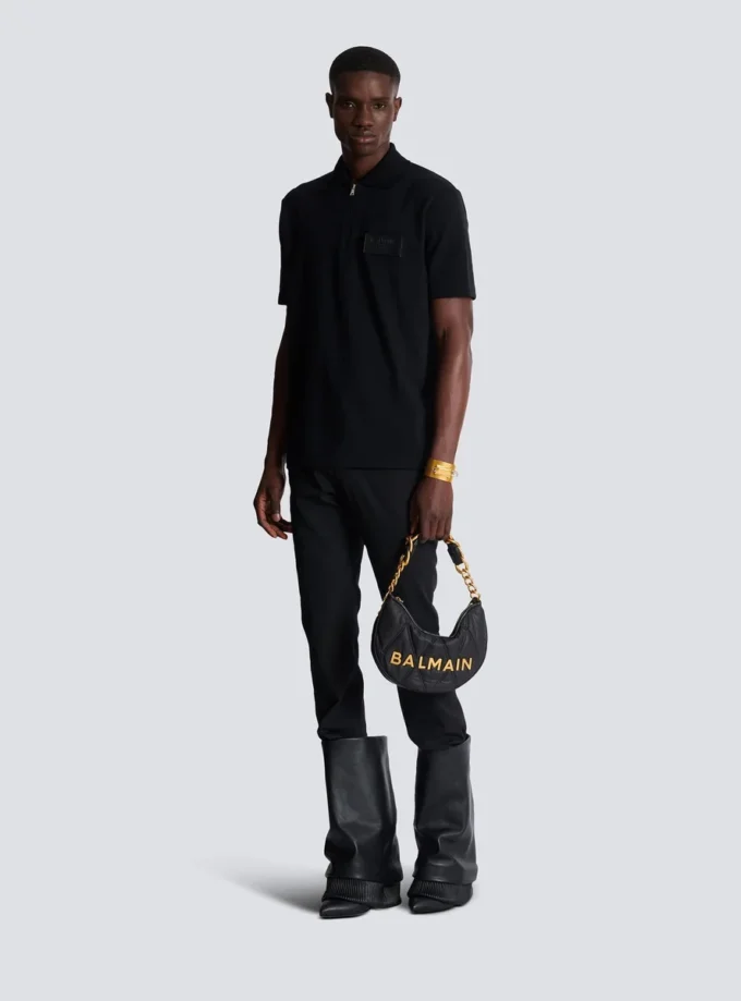 Cotton polo shirt with leather Balmain Couture label Cotton polo shirt with leather Balmain Couture label