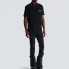 Cotton polo shirt with leather Balmain Couture label Cotton polo shirt with leather Balmain Couture label