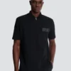 Cotton polo shirt with leather Balmain Couture label Cotton polo shirt with leather Balmain Couture label