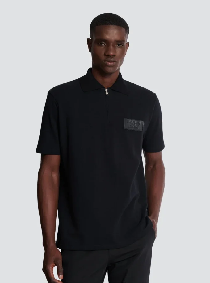 Cotton polo shirt with leather Balmain Couture label Cotton polo shirt with leather Balmain Couture label
