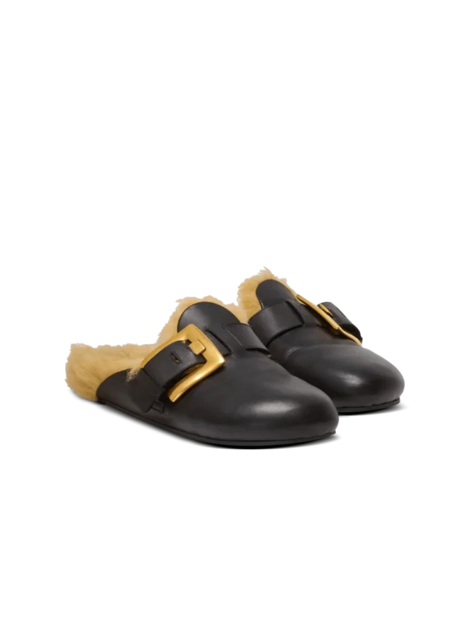 Flat leather and faux fur mules Flat leather and faux fur mules