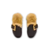 Flat leather and faux fur mules Flat leather and faux fur mules
