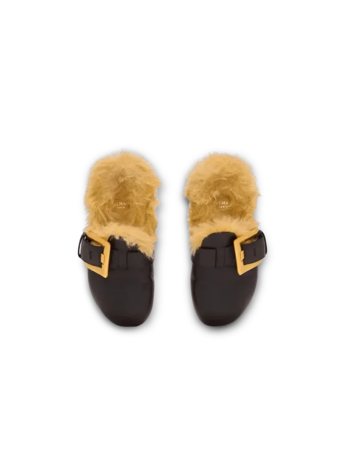 Flat leather and faux fur mules Flat leather and faux fur mules
