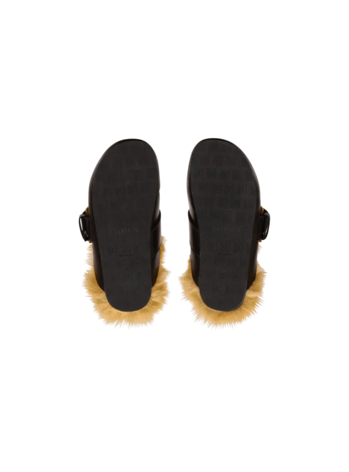 Flat leather and faux fur mules Flat leather and faux fur mules