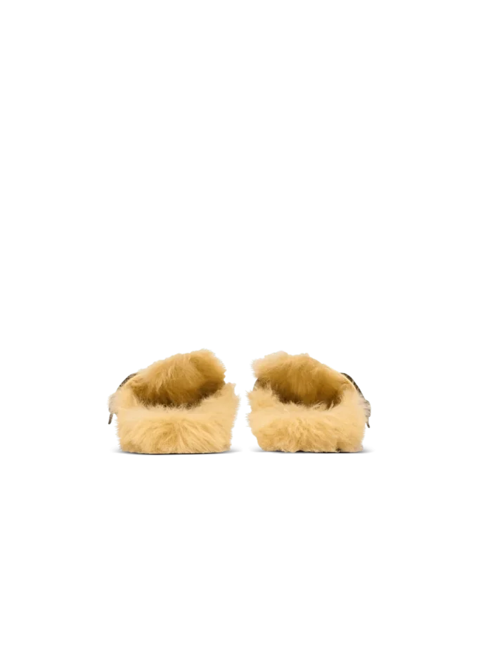 Flat leather and faux fur mules Flat leather and faux fur mules
