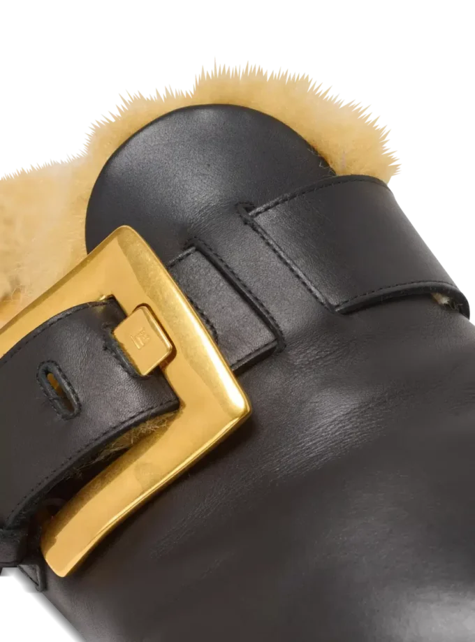 Flat leather and faux fur mules Flat leather and faux fur mules