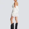 Flowing dress with lace ruffles Flowing dress with lace ruffles