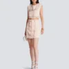 High-waist buttoned tweed mini skirt