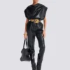 High-waisted faux leather trousers