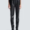 High-waisted faux leather trousers