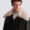 Leather jacket with shearling collar
