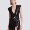 Long draped sequin dress with embellished detail