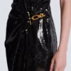 Long draped sequin dress with embellished detail