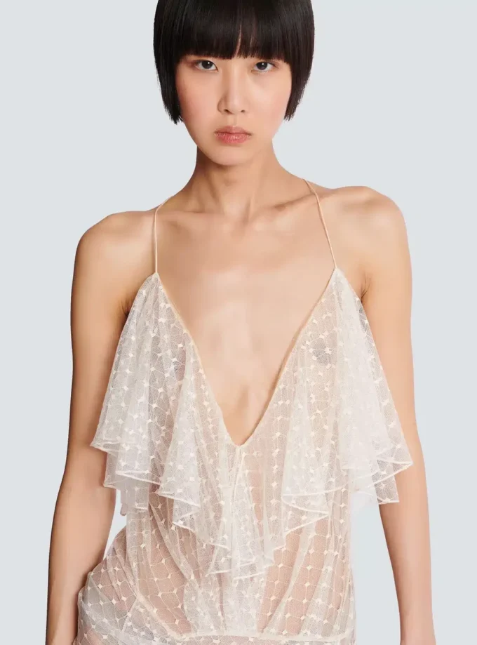 Long flowing dress with lace ruffles Long flowing dress with lace ruffles