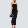 Long sleeveless dress with embellished detail Long sleeveless dress with embellished detail