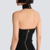 Long sleeveless dress with embellished detail Long sleeveless dress with embellished detail