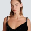 Long velvet dress with embellished straps Long velvet dress with embellished straps