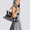 Medium Anthem bag in leather and zebra-print ponyskin Medium Anthem bag in leather and zebra-print ponyskin