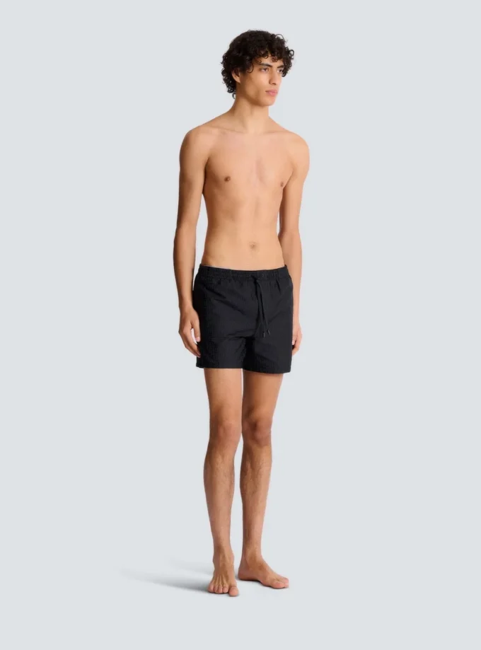 Monogrammed swim shorts