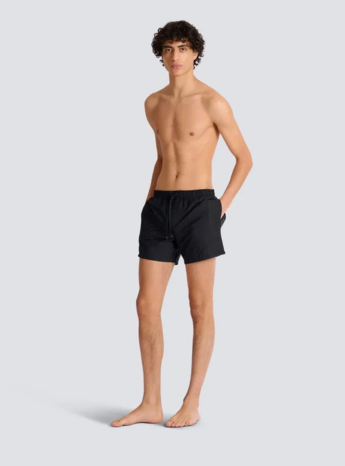 Monogrammed swim shorts