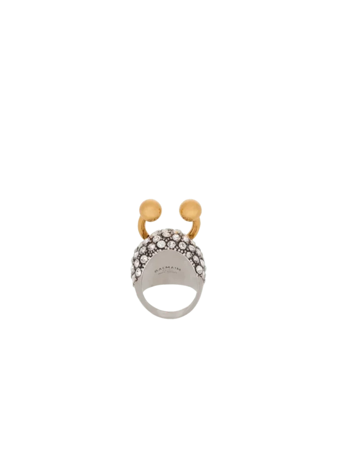 Piercing brass and rhinestone ring