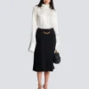 Pleated silk midi skirt with embellished detail