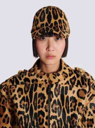 Ponyskin-style leather cap with leopard pattern Ponyskin-style leather cap with leopard pattern