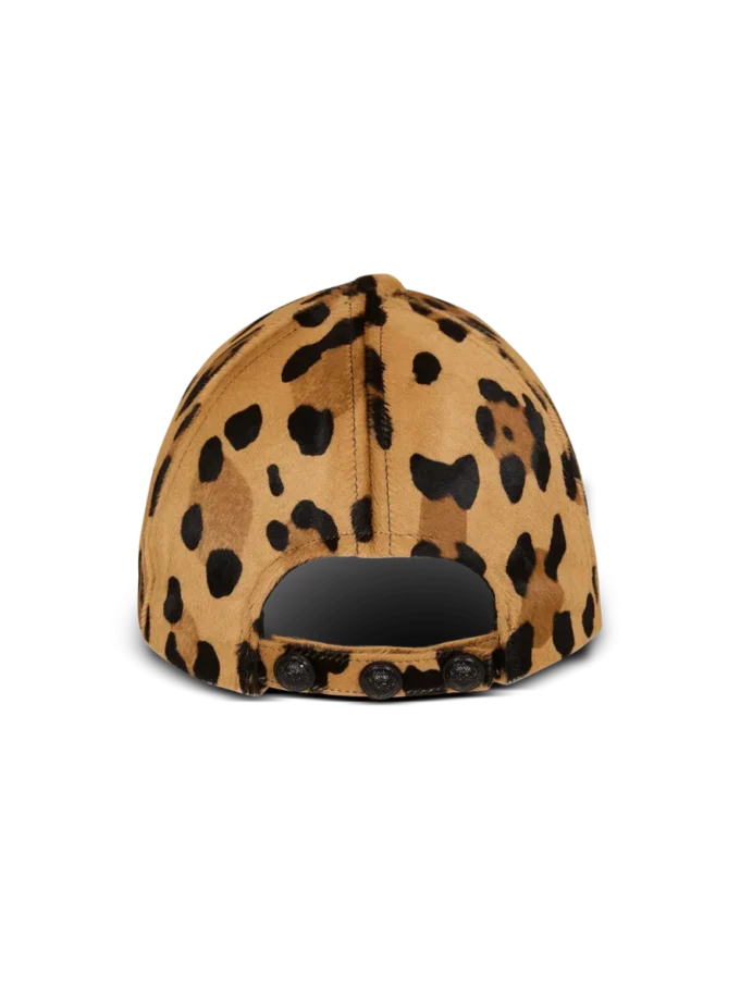 Ponyskin-style leather cap with leopard pattern