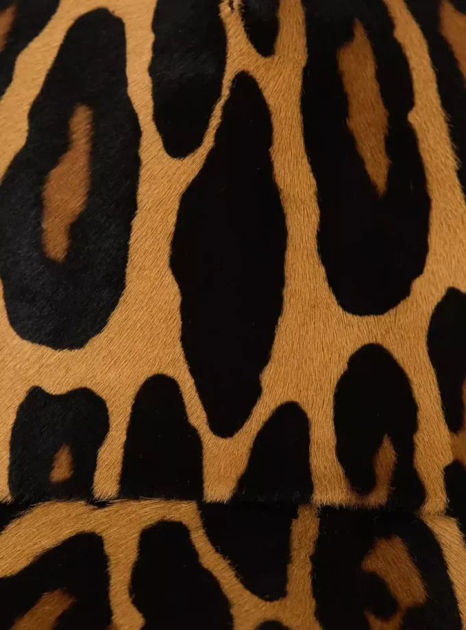 Ponyskin-style leather cap with leopard pattern