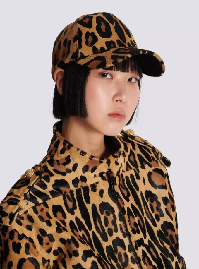 Ponyskin-style leather cap with leopard pattern