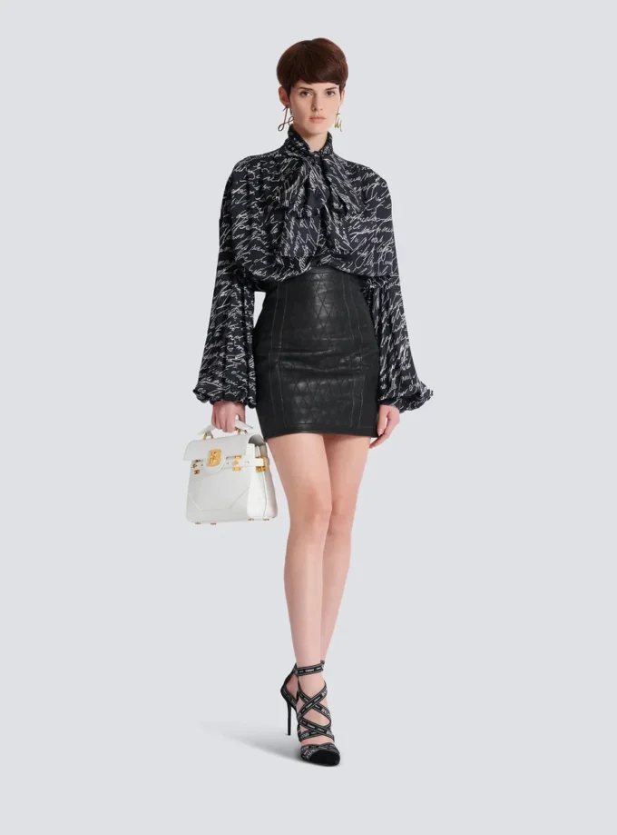 Quilted lambskin skirt with diamond motif Quilted lambskin skirt with diamond motif