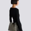 Release Bucket bag in jacquard and calfskin