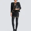 Short lambskin skirt with chains Short lambskin skirt with chains