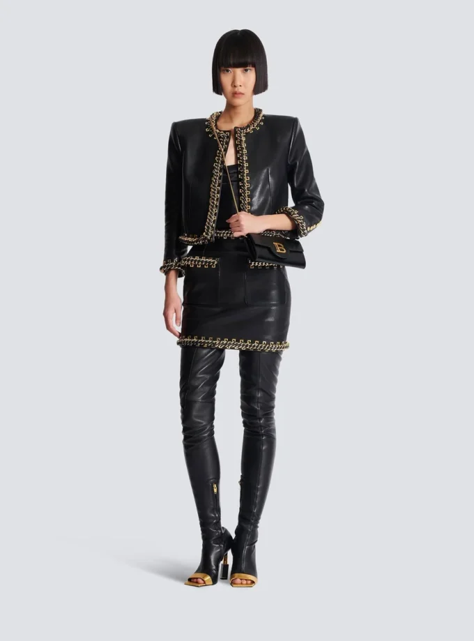 Short lambskin skirt with chains Short lambskin skirt with chains