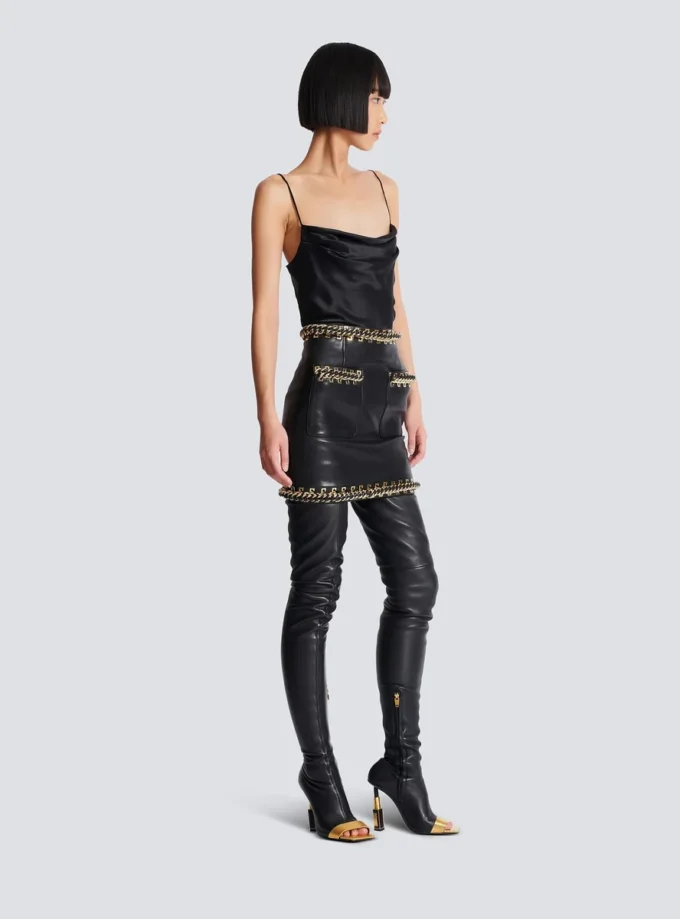 Short lambskin skirt with chains Short lambskin skirt with chains