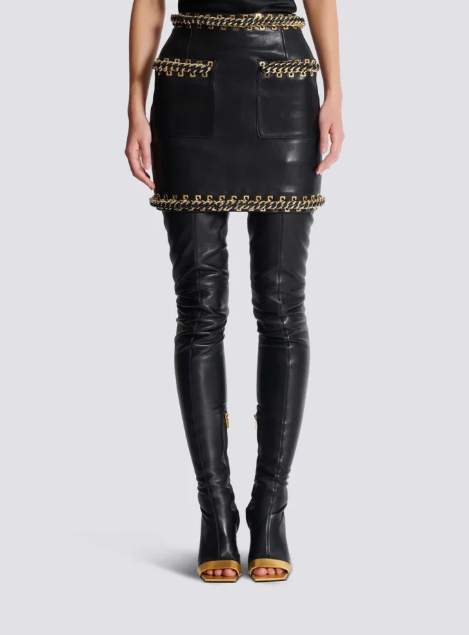Short lambskin skirt with chains Short lambskin skirt with chains