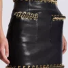 Short lambskin skirt with chains Short lambskin skirt with chains