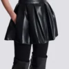 Short pleated faux leather skirt Short pleated faux leather skirt