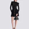 Short pleated skirt in plaid knit Short pleated skirt in plaid knit