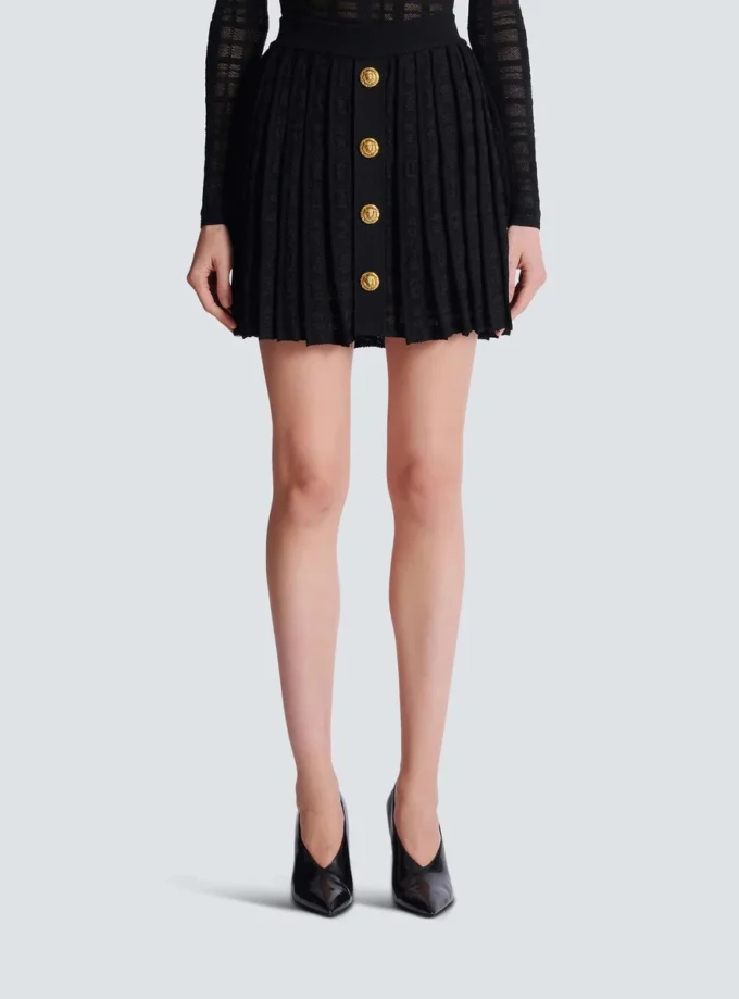 Short pleated skirt in plaid knit Short pleated skirt in plaid knit