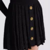 Short pleated skirt in plaid knit Short pleated skirt in plaid knit