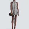 Sleeveless flared tweed dress Sleeveless flared tweed dress