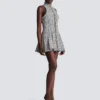 Sleeveless flared tweed dress Sleeveless flared tweed dress