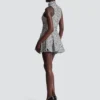 Sleeveless flared tweed dress Sleeveless flared tweed dress